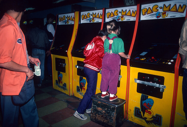 '80s Kids Playing Pac-Man At An Arcade