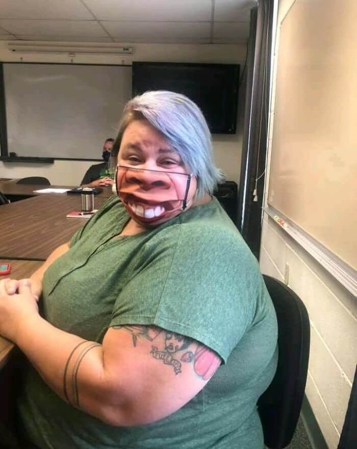 Wearing A Unique Mask To A Staff Meeting