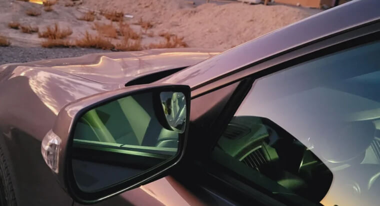 Huge Truck-Style Mirrors on Small Cars