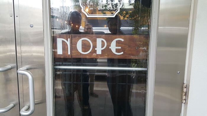 This Sign Moves The “N” When They Are Closed
