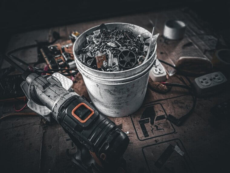 A Bucket of Assorted Nails, Screws, and Bolts