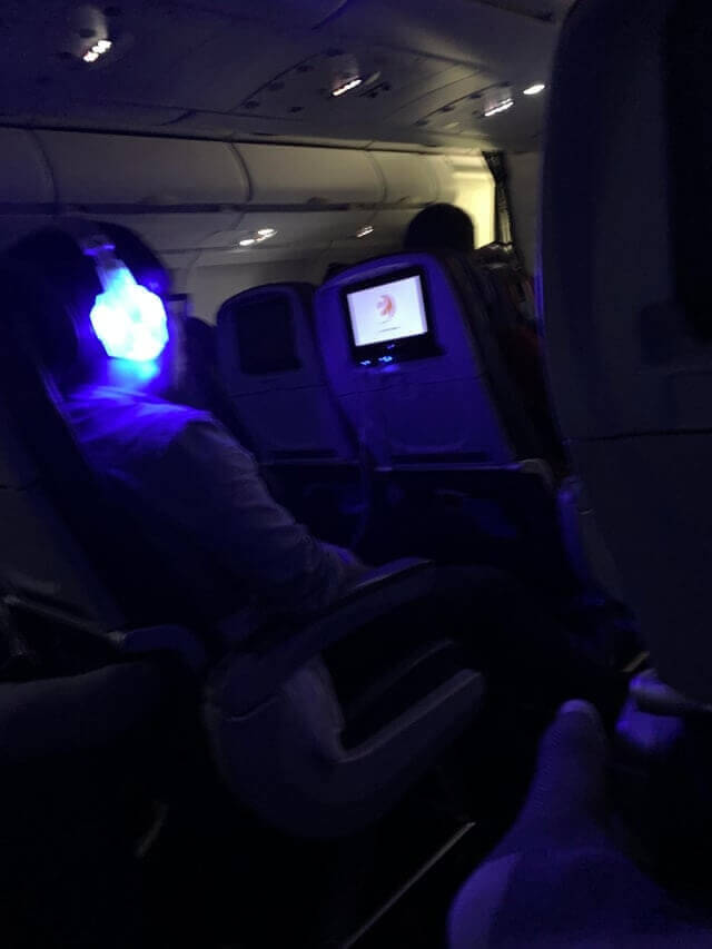 This Guy Decided To Bring The Brightest Headphones For A 9 Hour Flight