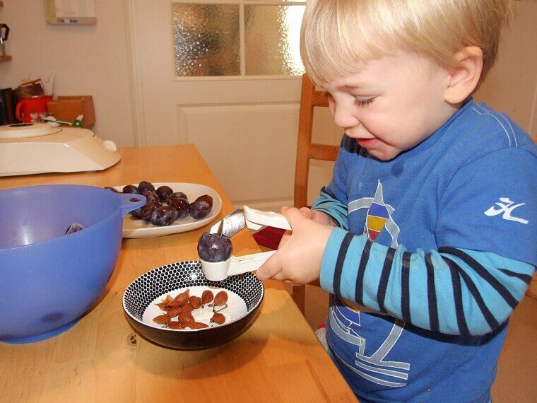 Use a Pitted Cherry or Olive Pit to Clean Narrow Vases
