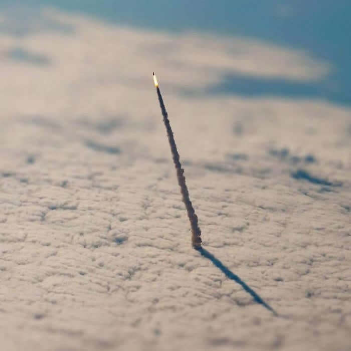 A Space Shuttle Leaving Earth's Atmosphere