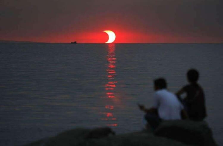 When A Sunset And Solar Eclipse Happen At The Same Time