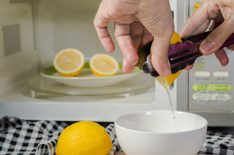 Tongs: Squeezing Citrus Halves for Maximum Juice