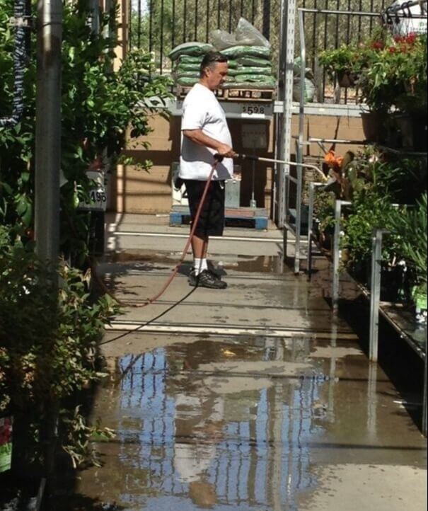 Dad Saw Wilted Plants At Walmart And Decided To Water Them...He Doesn't Work There