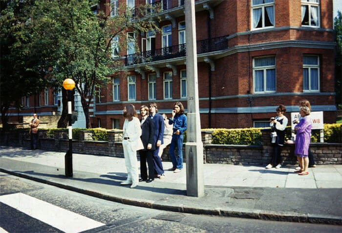 The Beatles Preparing To Walk Across The Famous Abbey Road