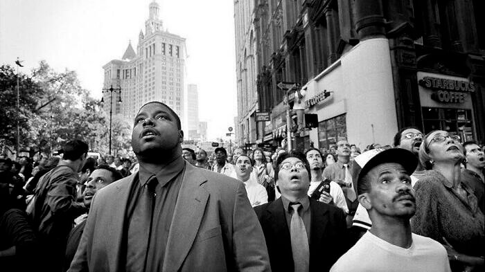 Passersby Notice What Is Happening At The Twin Towers On 9/11