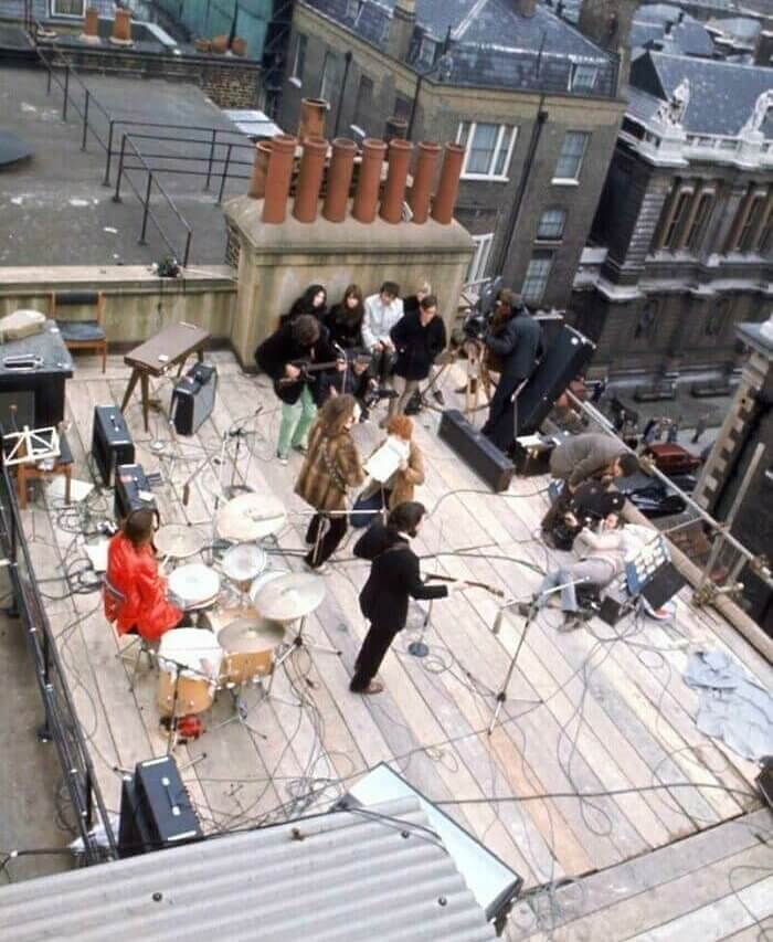 The Beatles Hanging Out On The Rooftop During Their Concert