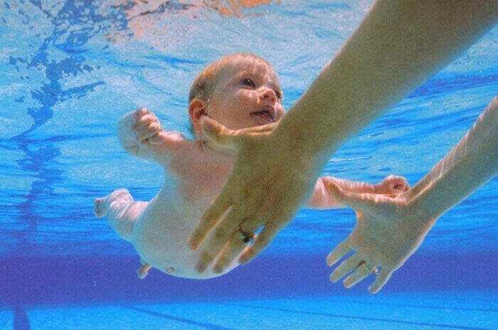 The Nirvana Album 'Nevermind' Baby Enjoying The Pool In Real Life