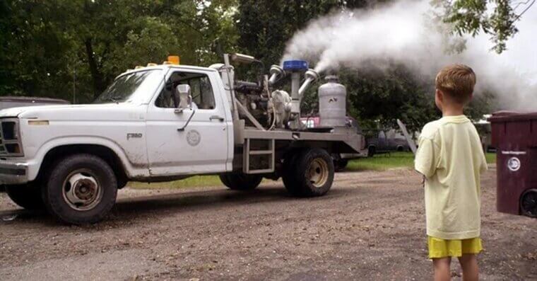 Running Behind the Mosquito Fogger Truck