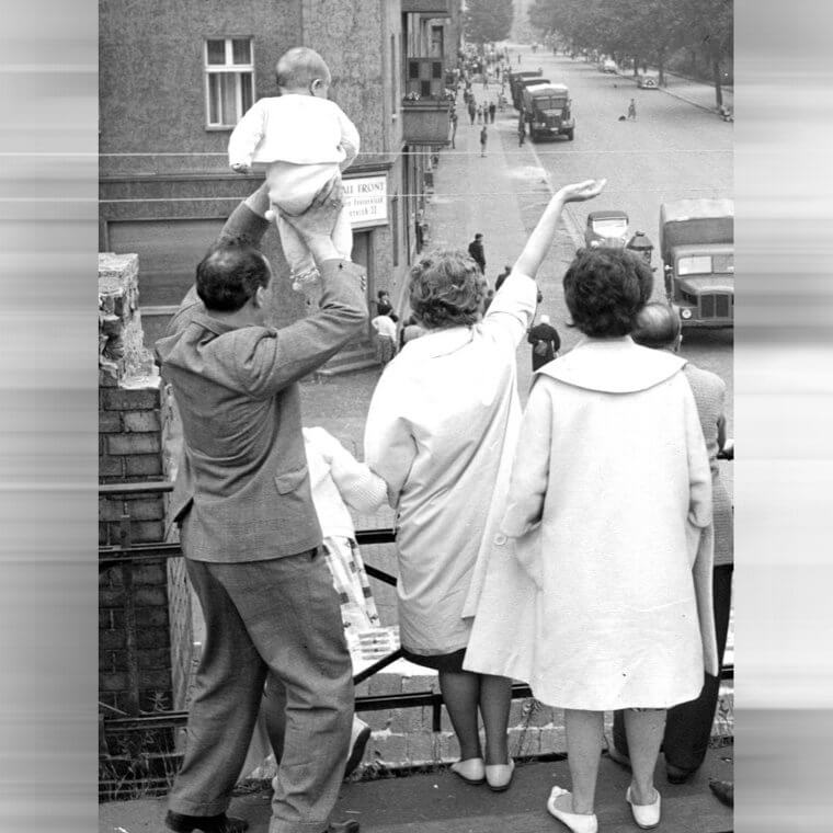 Waving To Family Over The Berlin Wall
