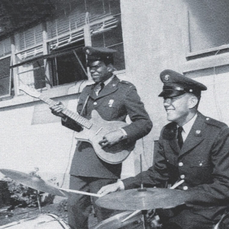 Jimi Hendrix Playing Guitar in the United States Army