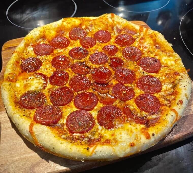 Pizza With Extra Cheese and Processed Meats