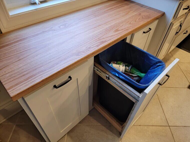 Install Pull-Out Trash Bins in Cabinets