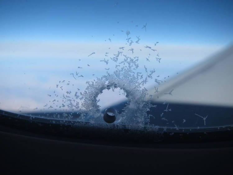 Why There Are Holes in Airplane Windows?