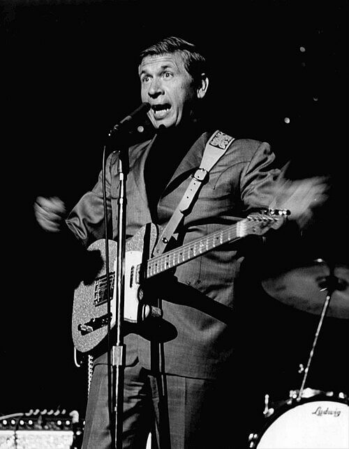Buck Owens Electrified Audiences in Bright Red White and Blue Suits