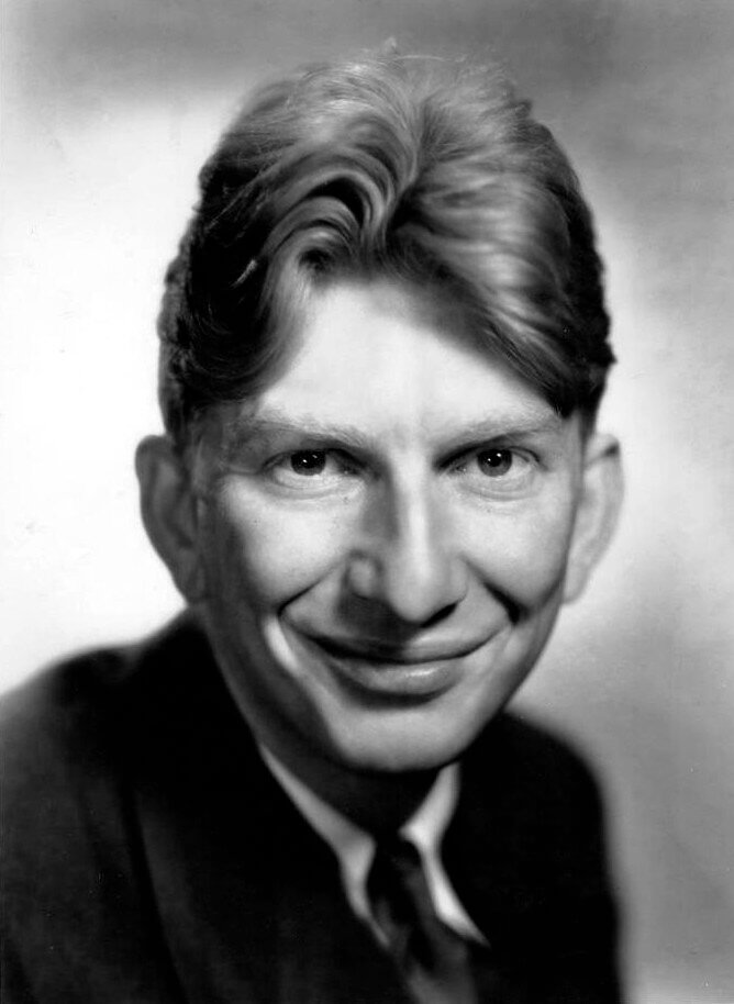 Sterling Holloway as Winnie the Pooh in "The Many Adventures of Winnie the Pooh" and the Cheshire Cat and Kaa the Snake