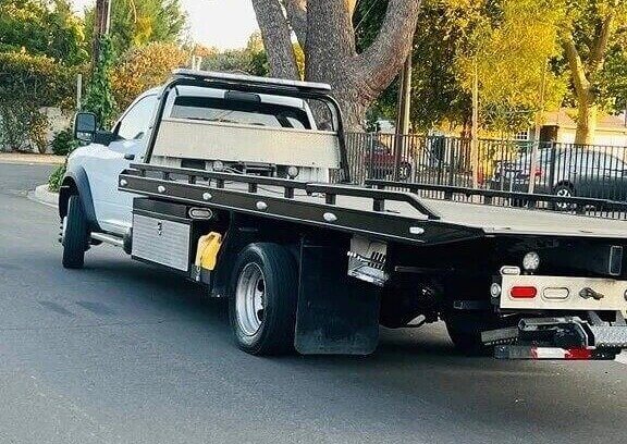 2023 Ram 5500 Long Flatbed Tow Truck - $1,000 (Bidding)