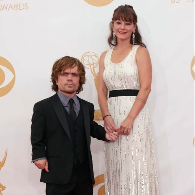 Peter Dinklage (4’4″) & Erica Schmidt (5’5″) – 13 inches