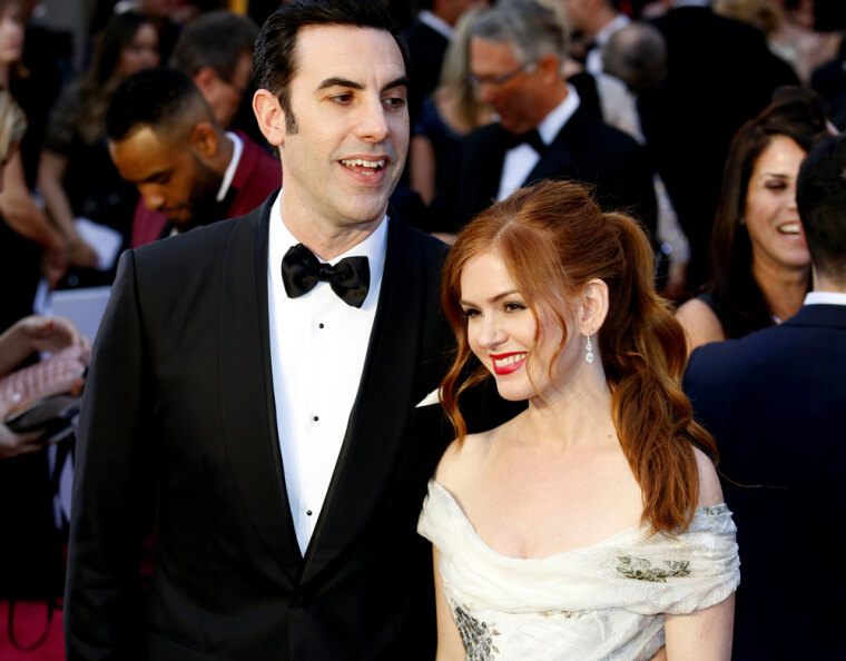 Sacha Baron Cohen (6’3″) & Isla Fisher (5’2″) – 13 inches