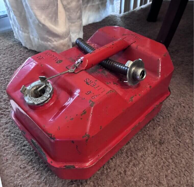 Old Metal Gasoline Cans with Spouts
