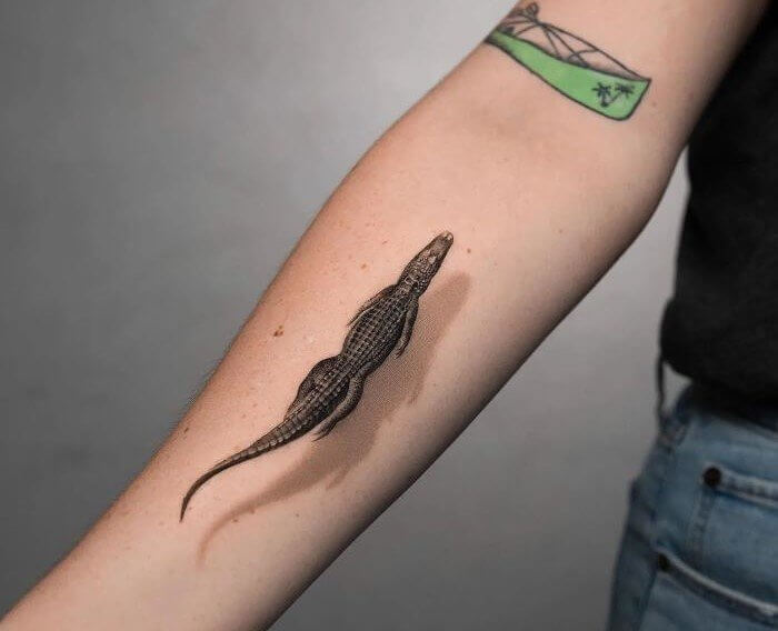 It Appears to Be Swimming up His Arm!
