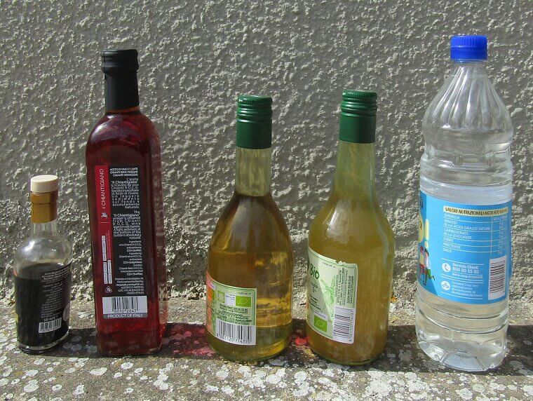 Use White Vinegar to Kill Stubborn Weeds Growing in Your Driveway