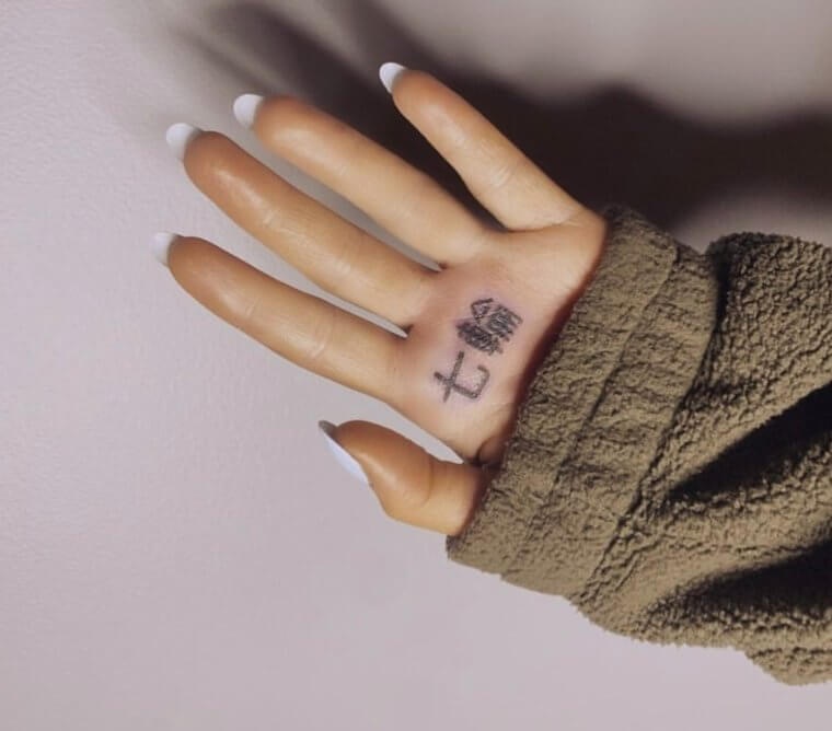 Ariana Grande's "small Charcoal Grill" Tattoo