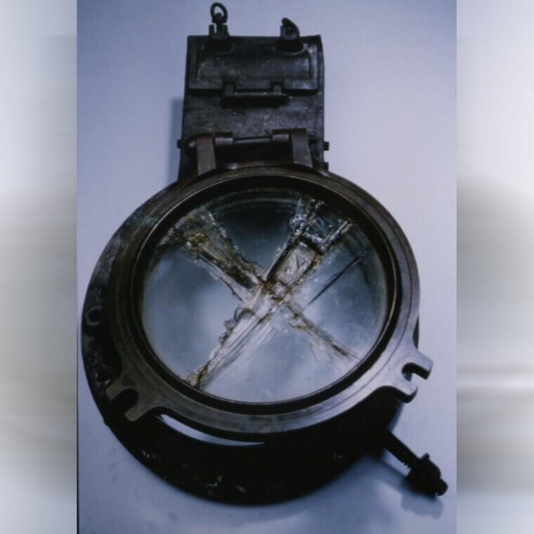 A Cracked, Open Porthole