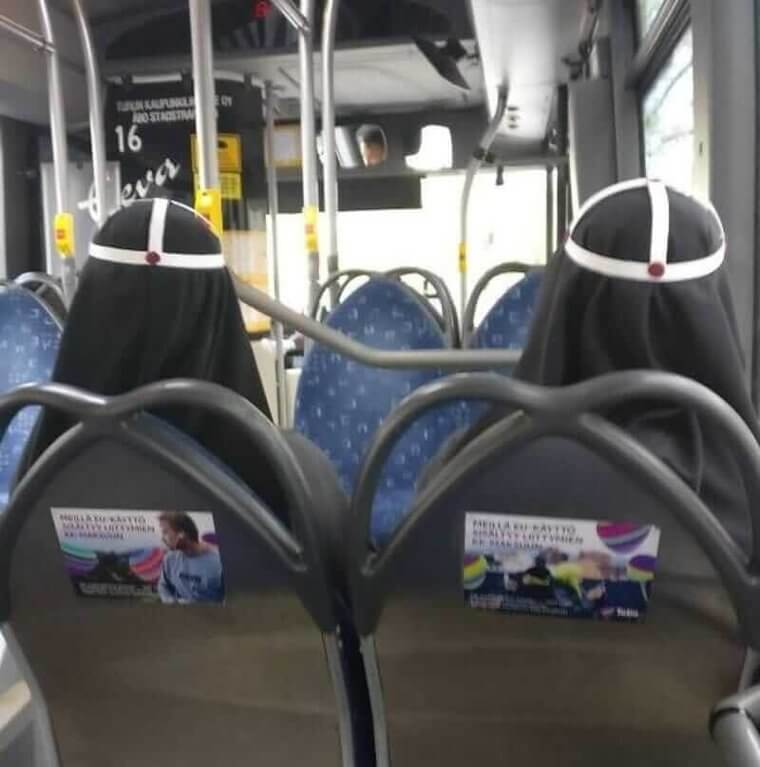 Why Do These Nuns Have A Circle With A Purple Dot On Their Heads?