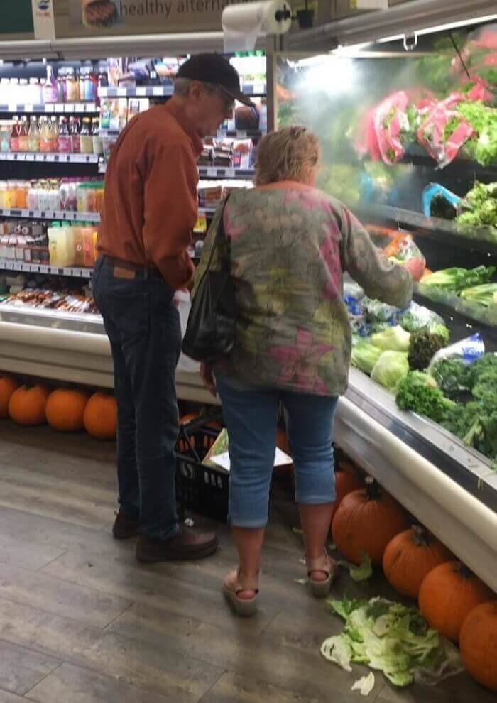 Ripping Off The “Bad” Lettuce From Each Head Until She Finds One With Enough Left Over