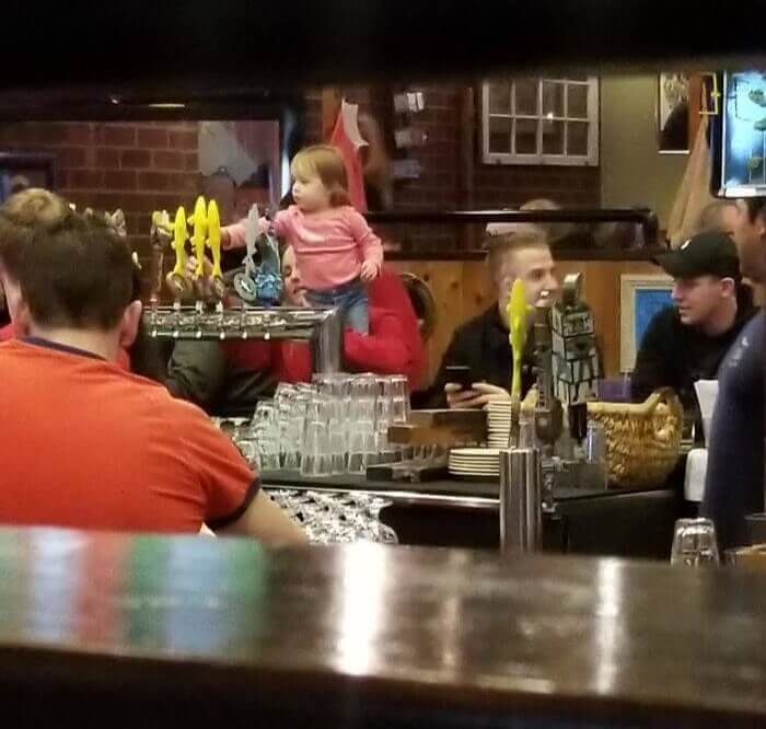 Nothing Screams Parenting Win Like Letting Your Kid Stand On The Bar And Play With The Taps