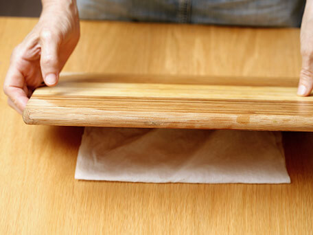 Prevent Your Cutting Board From Sliding With A Damp Towel