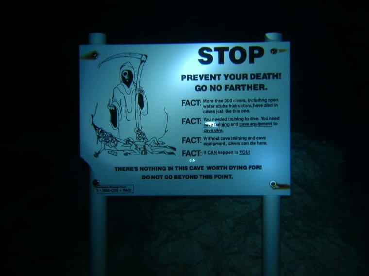 This Spooky Sign Outside An Underwater Cave