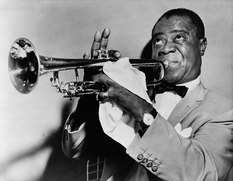 Louis Armstrong: Delivered Coal and Scavenged for Food in Trash Bins at Age 7