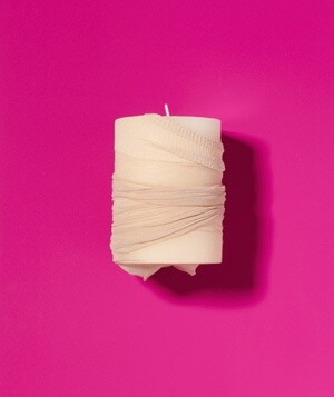 Utiliza las medias para devolver la vida a las viejas velas