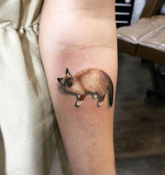 É Uma Tattoo Animalesca