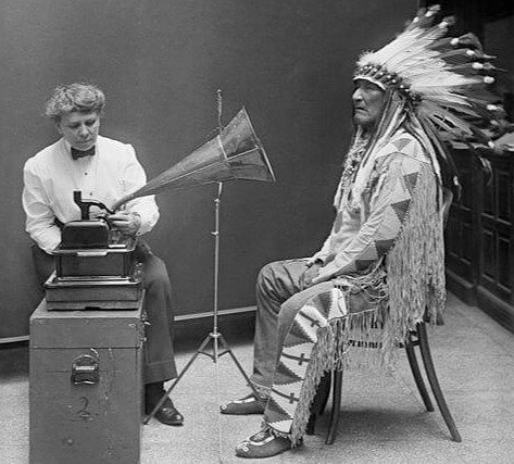 Mountain Chief Translates Song Into Native American Sign Language, 1916