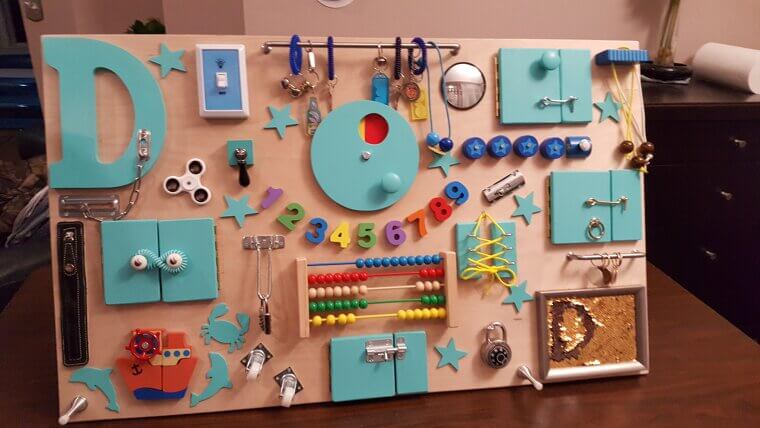 Activity Board With Locks and Latches