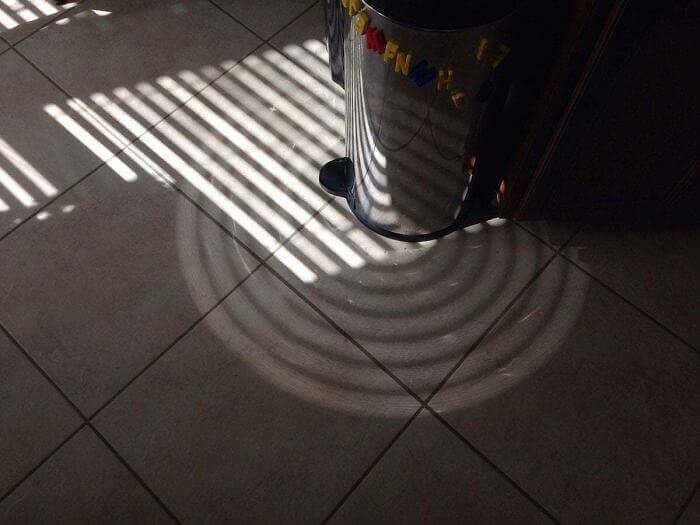 What Happens When Light Passes Through The Blinds And Hits My Trash Can