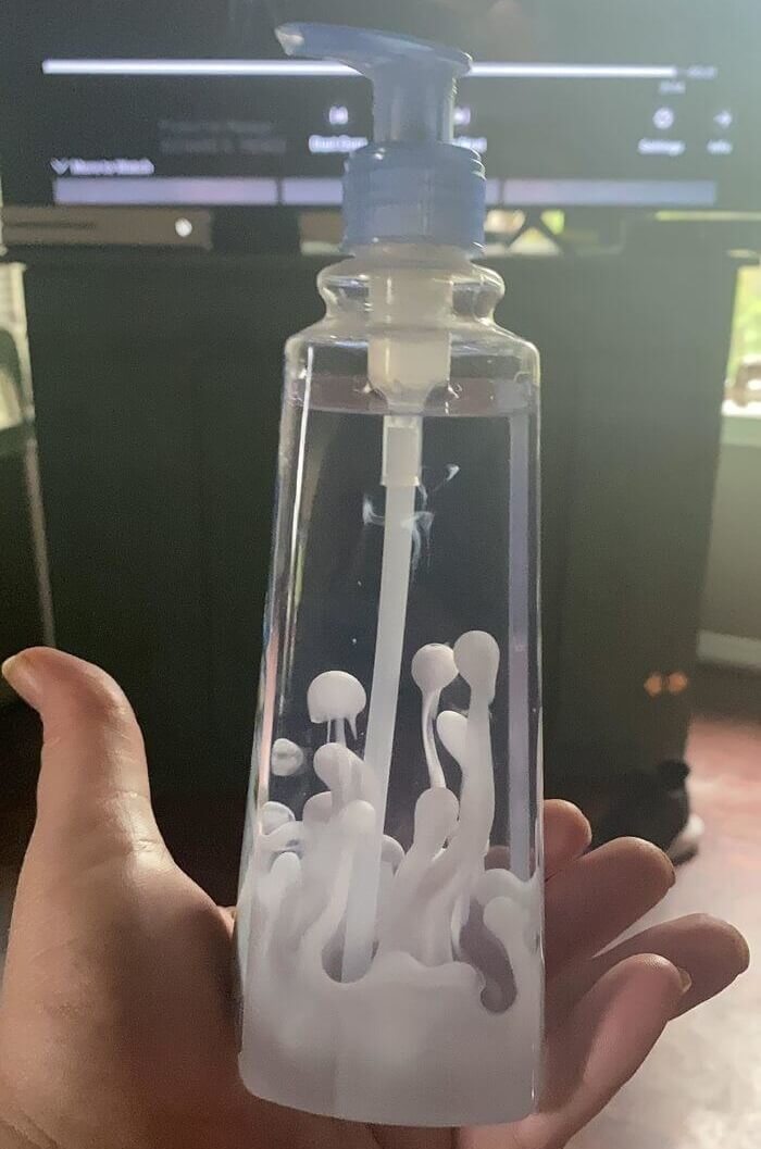 Refilling A Soap Container With Clear Soap When It Still Had Old Soap Inside