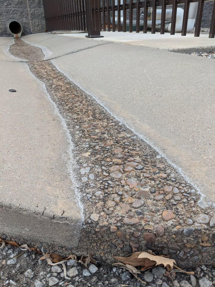 Water Flowing Through The Cement For A Long Time