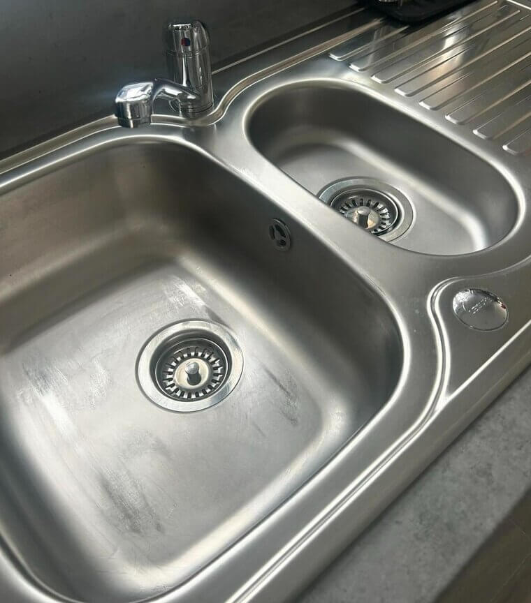 Use Baking Soda and Vinegar to Freshen up the Kitchen Sink