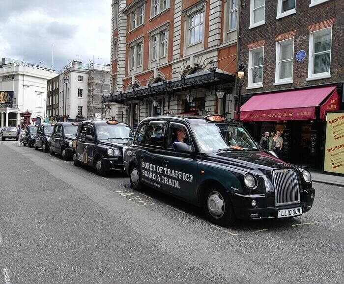 Healthy Folks In Black Cabs