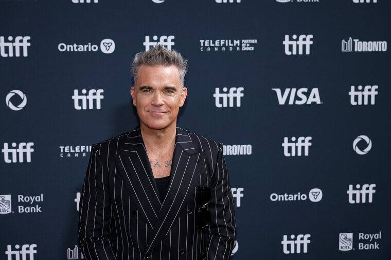Robbie Williams Almost Fronted Queen Instead of Adam Lambert