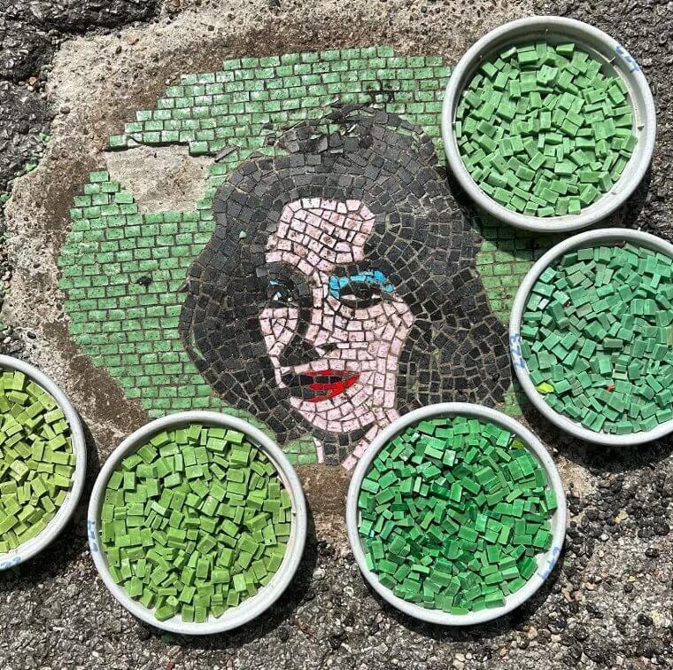 A Chicago Artist Creates Mosaics On Top Of Potholes