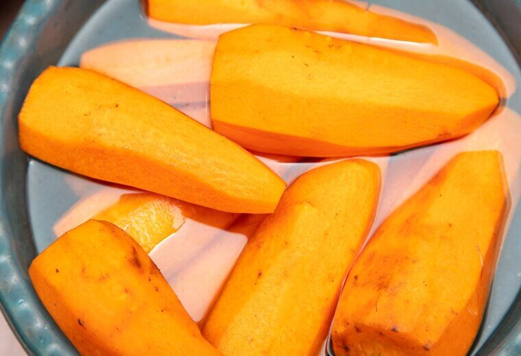 Submerge Peeled Carrots In A Container Of Filtered Water To Maintain Their Satisfying Snap