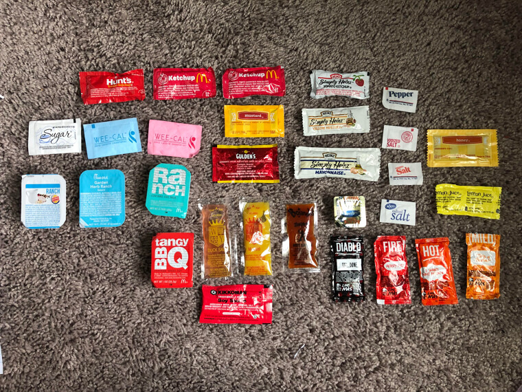 Sauce and Sugar Packets From a Restaurant